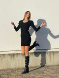 Abito in maglia con maxi fiocco sulla schiena