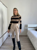 Maglione a righe con spacco nude Nero