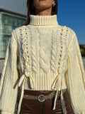 Maglione panna con trecce
