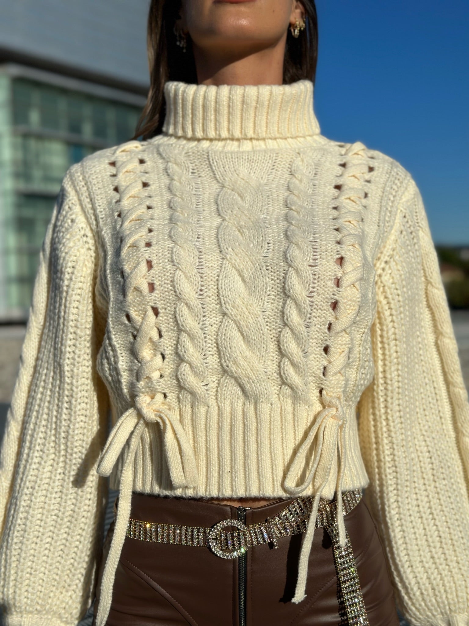 Maglione panna con trecce