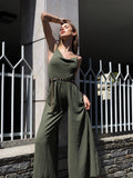 Tuta verde militare a palazzo spalline in catena