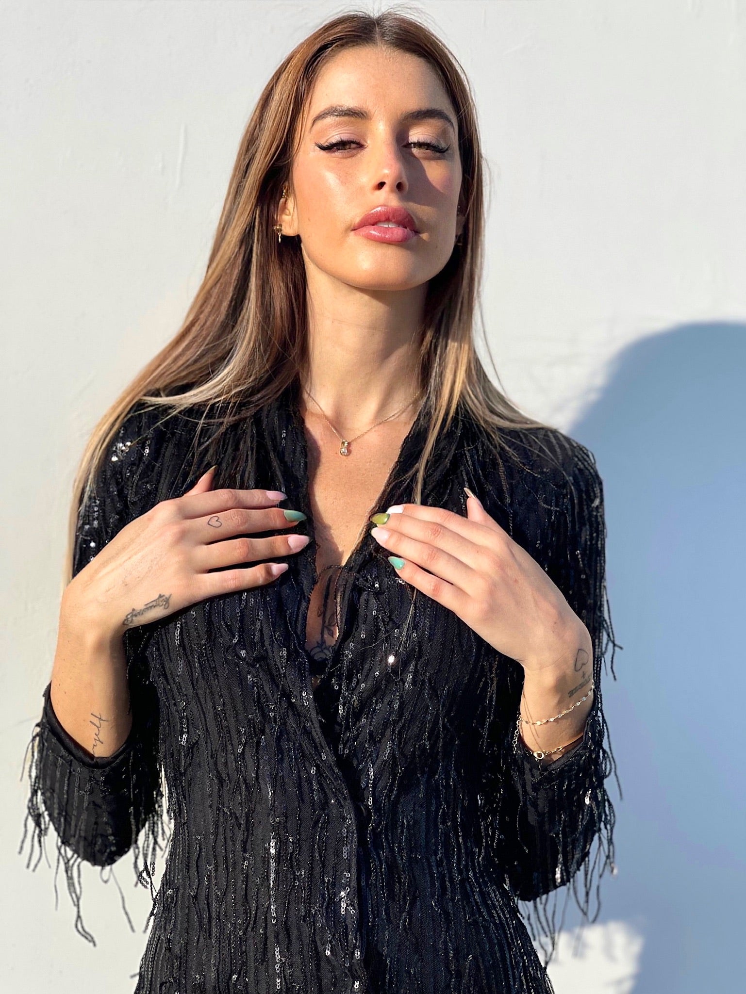 Abito nero frange in paillettes