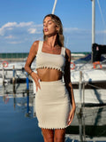 Completo top e gonna beige con perle