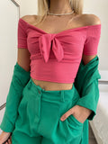 Top rosa barbie scollo a barchetta e fiocco