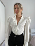 Camicia crop bianca con maniche a palloncino