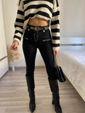 Jeans nero con lacci sul davanti