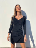 Abito glitter nero scollo a cuore