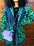 Cardigan verde con frange e cinta