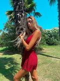 Tutina a bretellina glitter rosso scollo incrociato