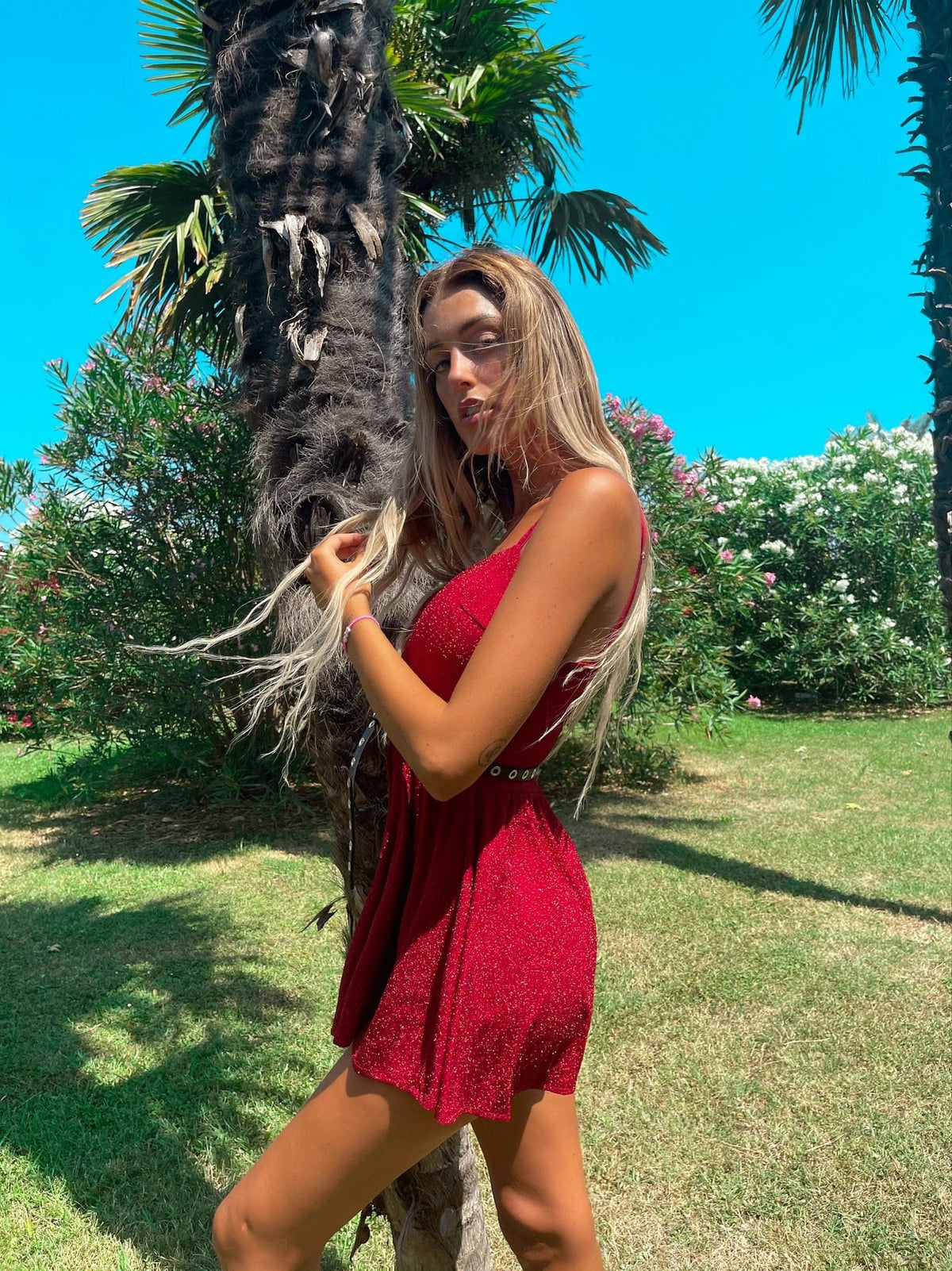 Tutina a bretellina glitter rosso scollo incrociato