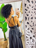 Abito in raso con maxi spacco nero a pois