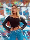 Top a costine con scollo a V