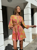 Abito con incrocio rosa lime