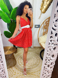 Abito con gonna ampia a pois rosso
