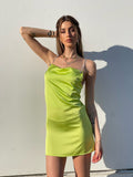 Abito in raso lime con dettaglio luce