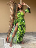 Abito con maxi spacco green con piume nere