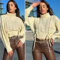 Maglione panna con trecce