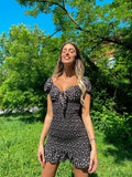Tubino aderente a fiori nero