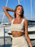 Completo top e gonna beige con perle