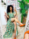 Abito lungo con maxi spacchi a fiori base verde