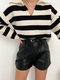 Short in ecopelle nero con cintura