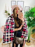 Giacca a quadri nera e fucsia