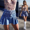 Gonna in jeans con pieghe e cinture