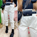 Pantalone bianco con marsupio