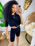 Completo sportivo maglia e pantaloncino nero