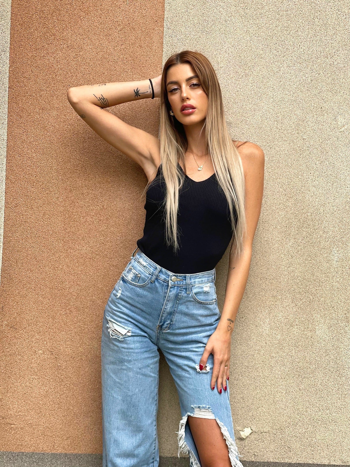 Top a costine nero spalline oro