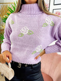 Maglione collo alto con rose lilla