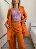 Completo oversize giacca e pantalone arancio