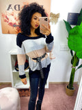 Maglione a righe bianco e rosa