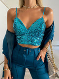 Top con paillettes petrolio