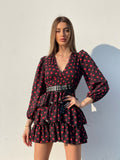 Abito nero a balze con cuori rossi