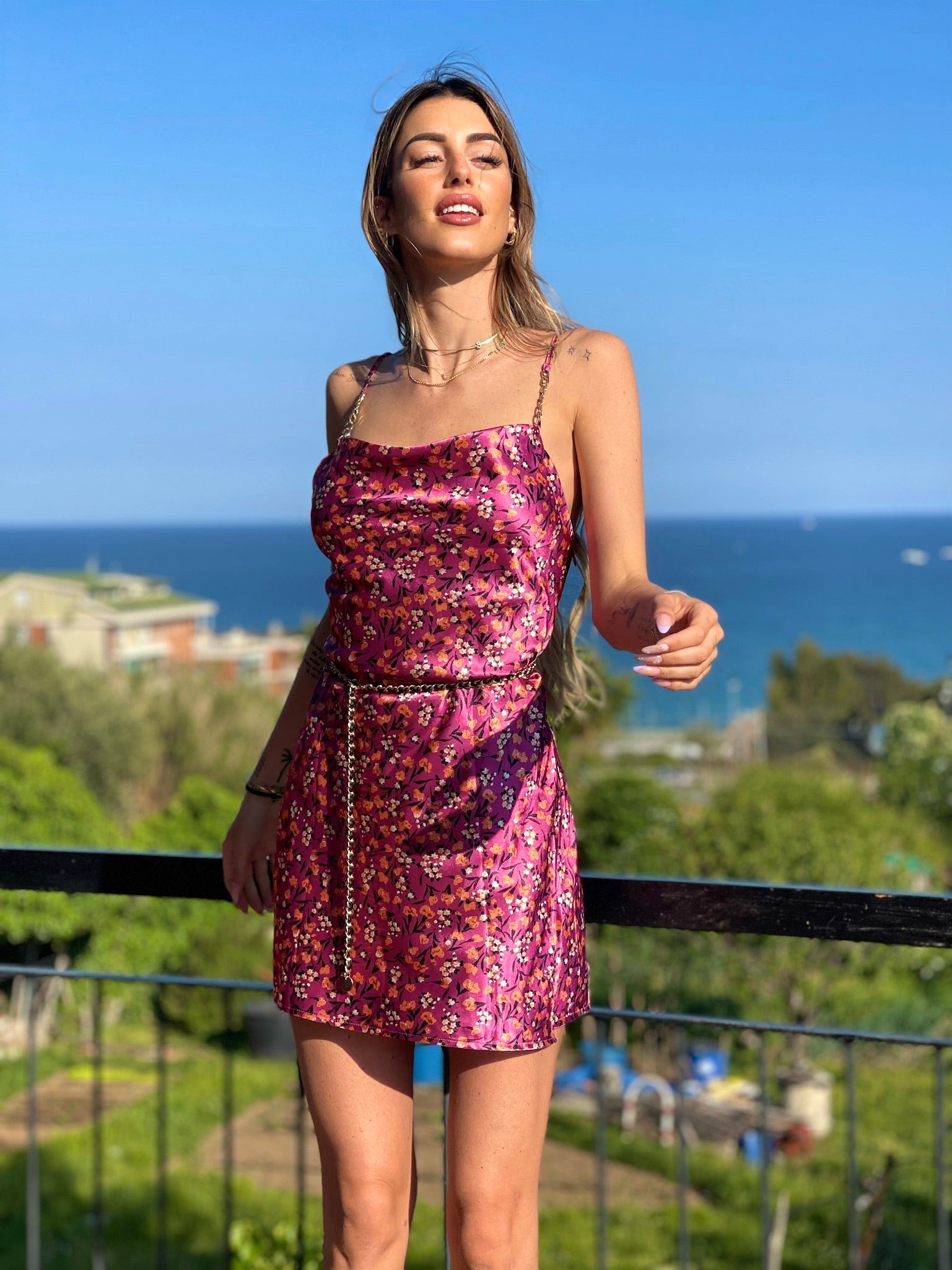 Abito a fiori fuxia