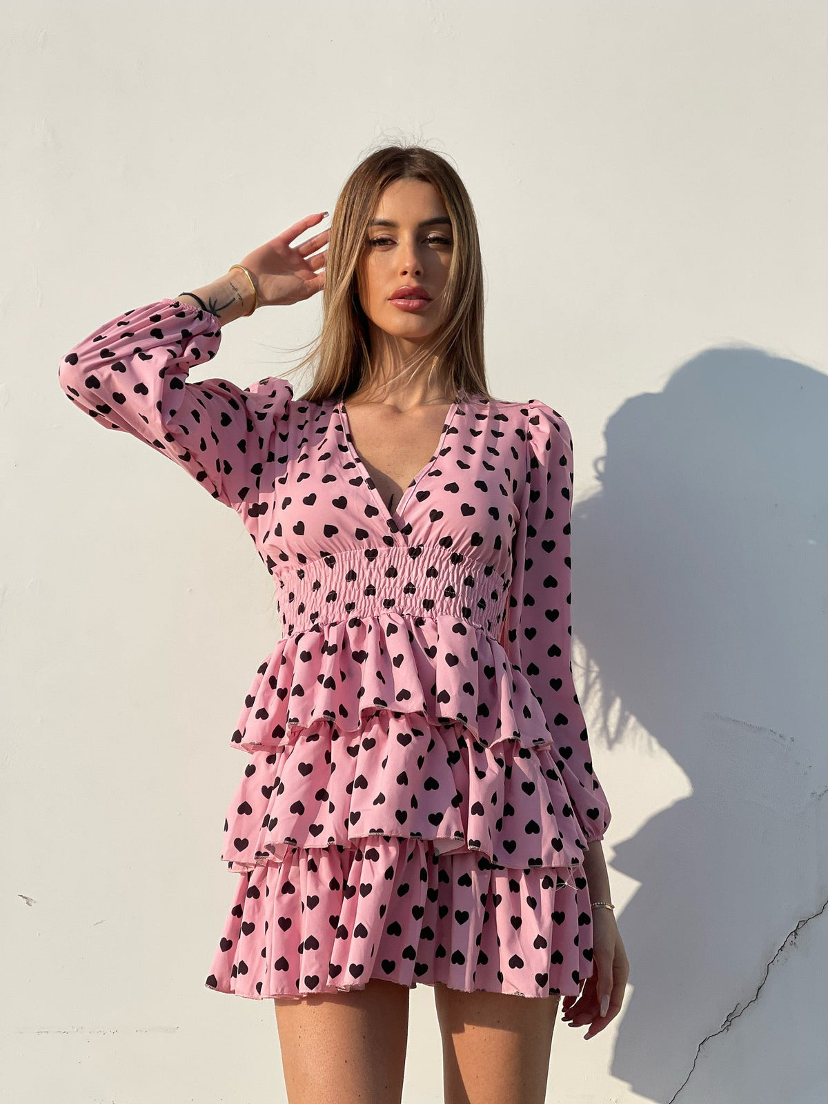 Abito a balze con cuori rosa