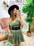 Abito verde con margherite