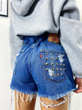 Short Levi’s Vintage bagno scuro con borchie