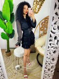 Abito a balze nero con glitter argento