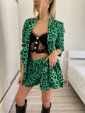 Completo giacca e Short maculato verde