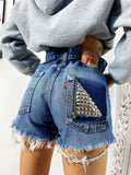 Short Levi’s Vintage bagno scuro con borchie