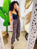 Pantalone con fiorellini e cinturina