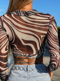 Maglia crop sfumature nude