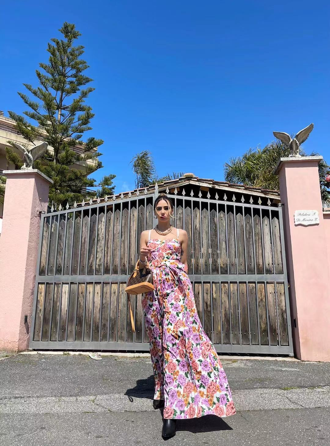 Tuta con pantalone a pieghine fiori lilla