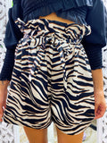 Short zebrato con fiocco