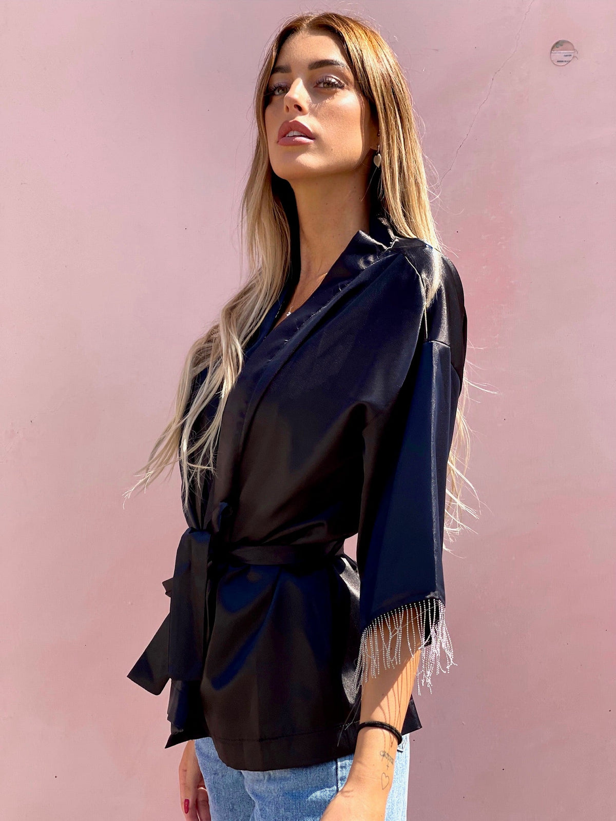 Blusa o kimono con frange