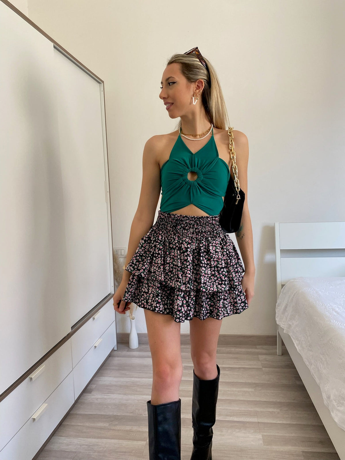 Top verde con oblò schiena aperta
