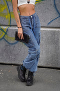 Jeans cargo con tasche