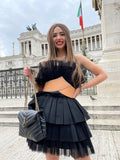 Abito in tulle con cintura